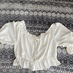 white cropped off the shoulder blouse